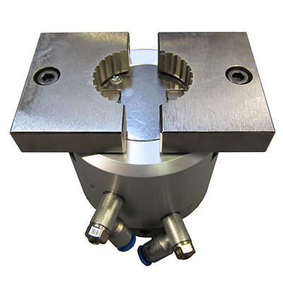 Secure, consistent gripping of Stelvin closures is enabled with this pneumatic split mandrel