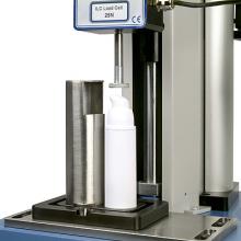 Testing the actuation force of a cosmetics pump dispenser with contents